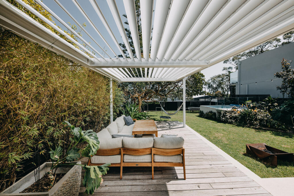 Backyard with louvres and swimming pool | Cover Co