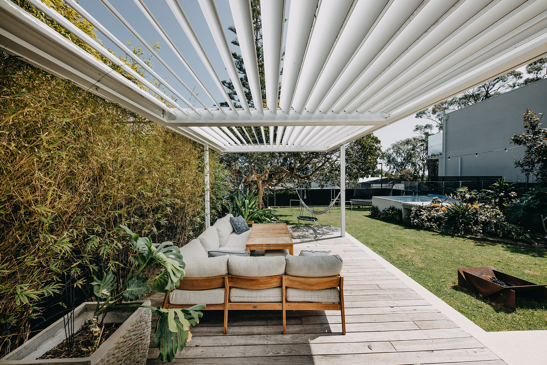 Backyard with louvres and swimming pool | Cover Co